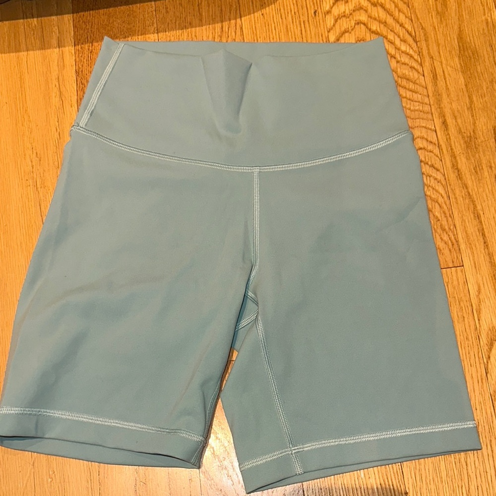 TNA Sage Green Bike Shorts with High-Rise Waistband and Stretchy Fit worn once